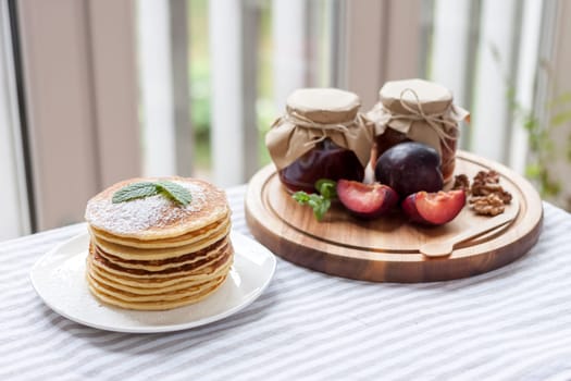 pancakes with plum jam delicious american breakfast