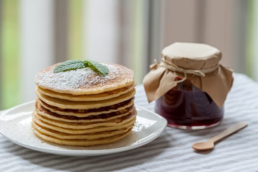 pancakes with plum jam delicious american breakfast