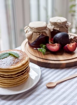 pancakes with plum jam delicious american breakfast
