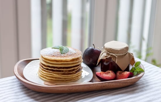 pancakes with plum jam delicious american breakfast