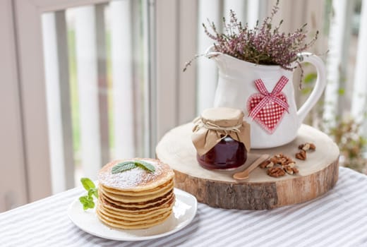 pancakes with plum jam delicious american breakfast