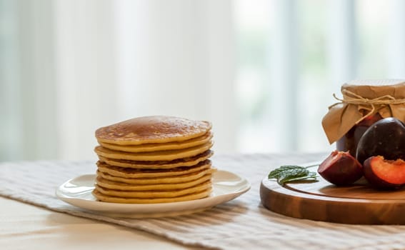 pancakes with plum jam delicious american breakfast