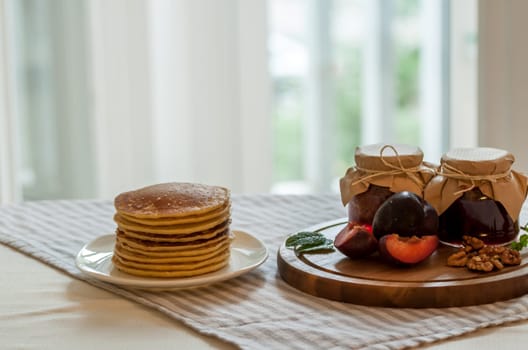 pancakes with plum jam delicious american breakfast