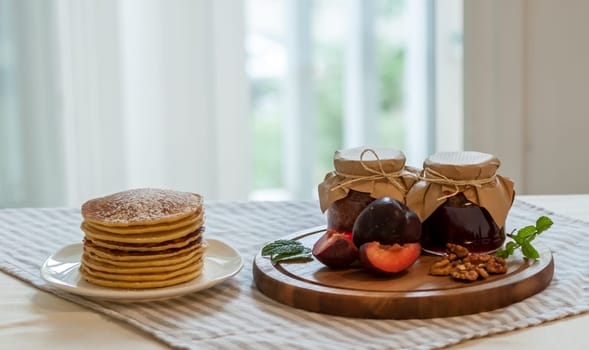pancakes with plum jam delicious american breakfast