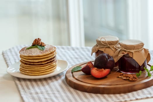 pancakes with plum jam delicious american breakfast