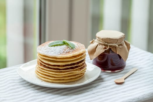 pancakes with plum jam delicious american breakfast