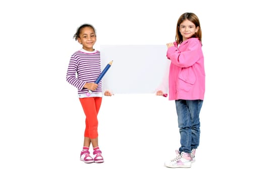 Children posing with a blank board isolated in white