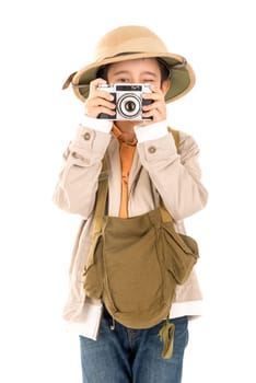 Young boy with a camera playing Safari isolated in white