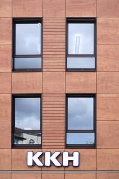 Mainz,Germany - August 21,2017: The façade of the modern office building of the Kaufmännische Krankenkasse KKH with logo and office windows on August 21,2017 in Mainz.