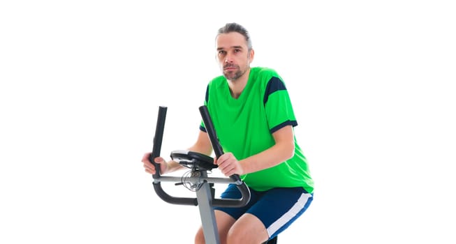 young man in green shirt train with fitness machine