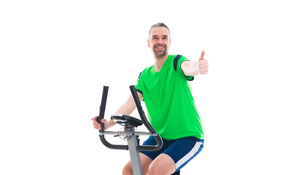 young man with thumb up train with fitness machine
