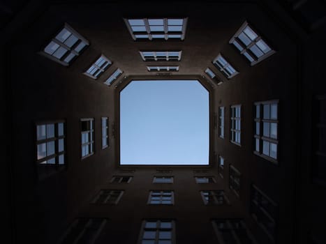 Inside Urban Backyard with Windows and Blue Sky Light Effect