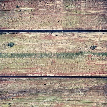 Wood texture with peeling paint. Weathered wooden boards background.