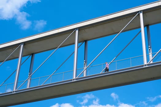 Official on a bridge between two government buildings in berlin's government district