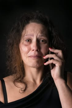 Abused woman victim of domestic violence, calling for help
