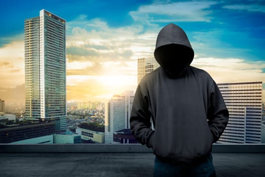Man in hoodie shirt is hacker. Computer security concept