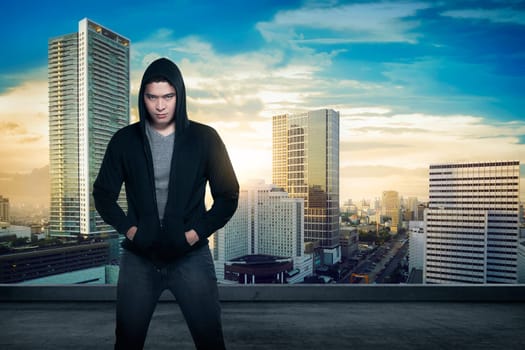 Man in hoodie shirt is hacker. Computer security concept