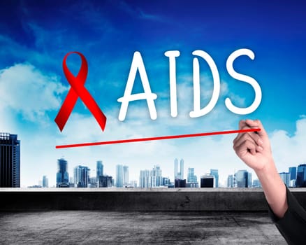 Hand draw red ribbon. AIDS Awareness concept