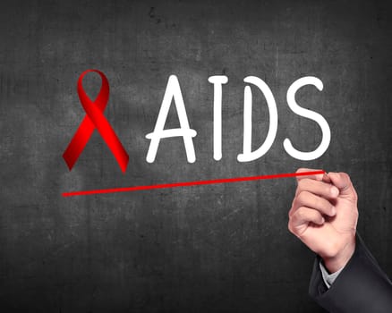 Hand draw red ribbon. AIDS Awareness concept