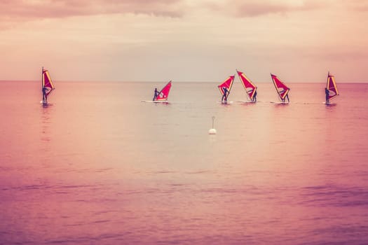 Beginners in a surf school - windsurfers on the Baltic Sea - people are not recognizable