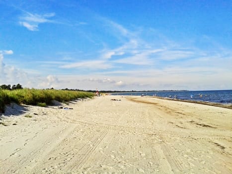 Beach in Marielyst, denmark with ocean baltic sea and blue sky