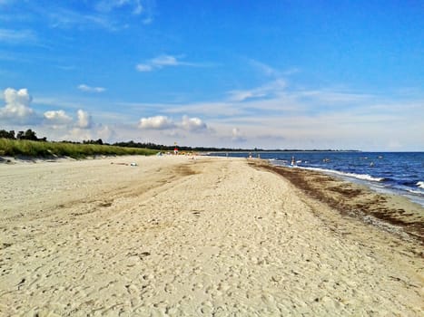 Beach in Marielyst, denmark with ocean baltic sea and blue sky