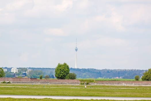 TV Tower Stuttgart - view from Airport Stuttgart, green meadow an runway in front