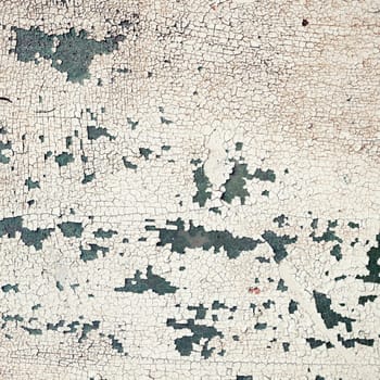 Peeling paint texture with cracks and rust. Vintage background.