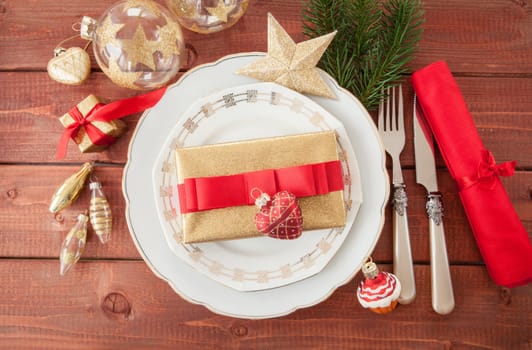 Colorful table set on rustic wood for Christmas