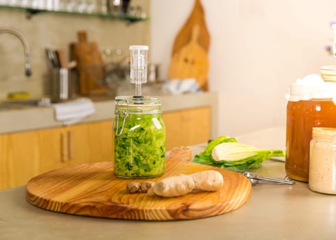 Fermented preserved vegetables. Cabbage kimchi and sauerkraut sour cabbage glass jars..