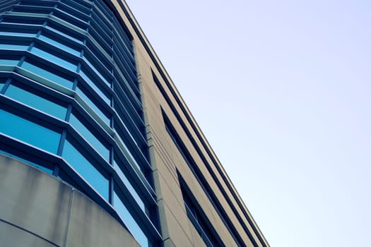 concrete building metal architecture round corner windows angle sky