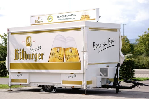 Mainz,Germany - August 20,2017: A sales stand and trailer for Bitburger brewing specialties on a forecourt of a football stadium on August 20,2017 in Mainz.