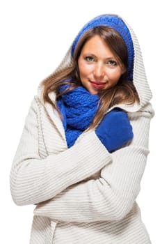attractive pretty young woman with blue wool hat with long dark hair in winter isolated on white background