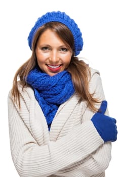 attractive pretty young woman with blue wool hat with long dark hair in winter isolated on white background
