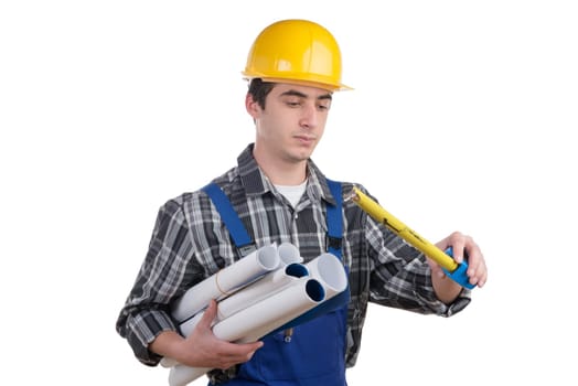 a worker measuring with a tape measure on the white background