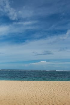 Beautiful secluded sandy beach in the Caribbean with white sand and blue sky as in paradise