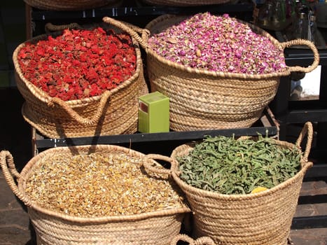 spices in baskets on open market in Morocco