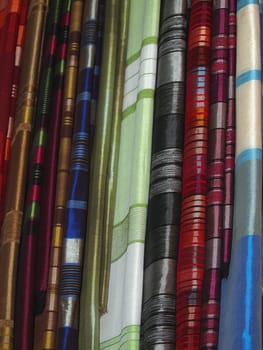 Pile of gentle folded shawls (scarfs) at the market