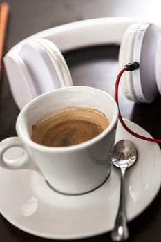 A white cup filled with delicious coffee
