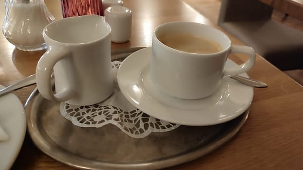 white cups coffee tea table cafe restaurant drink objects. High quality photo