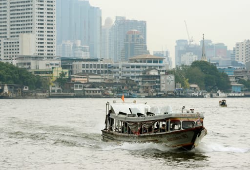 Ein Wassertaxi Boat auf dem Nam Chao Phraya River in der Stadt Bangkok in Thailand in Suedostasien.