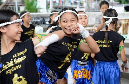 Children at a traditional Thai boxing show at Santichaiprakan Park at Mae Nam Chao Phraya in the capital Bangkok of Thailand in South East Asia.