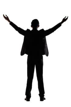 Silhouette of Asian businessman open arms feel free, rear view, full length portrait isolated on white background.
