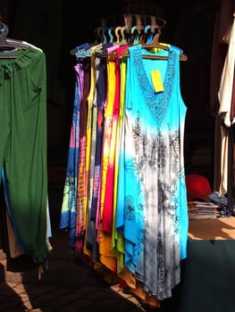 Cheap women's clothes at a street market,in Marrakech