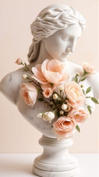 Stone statue covered with spring flowers on isolated background. High quality photo