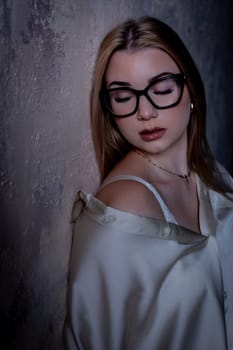 A refined portrait of a stylish woman in chic glasses soft lighting enhances the serene atmosphere