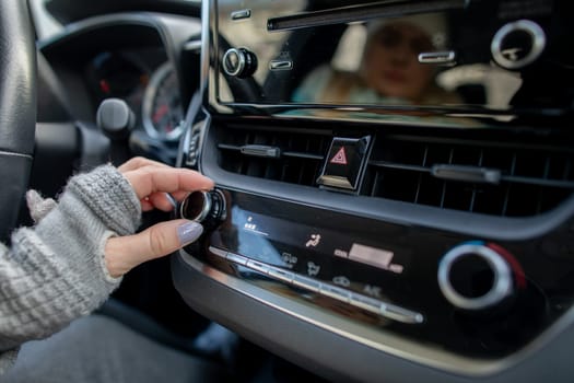 Capturing the special moment of tuning the radio in a modern car to enhance an enjoyable journey experience