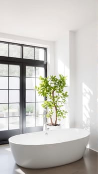Scandinavian style bathroom interior in light colors. The bathtub is located near the window. High quality photo