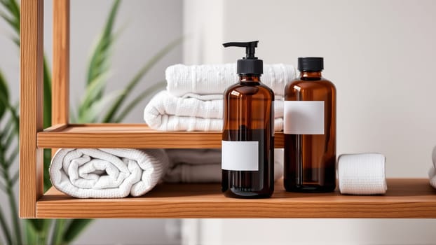 Spa treatment set, wooden shelf with neatly folded towels and dispensers for soap, cream, massage oil. High quality photo