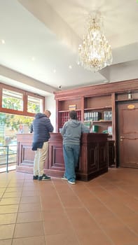 October 15 2024 Prague Czech Republic Europe Hotel reception area people travel tourists tourism room apartment . High quality photo